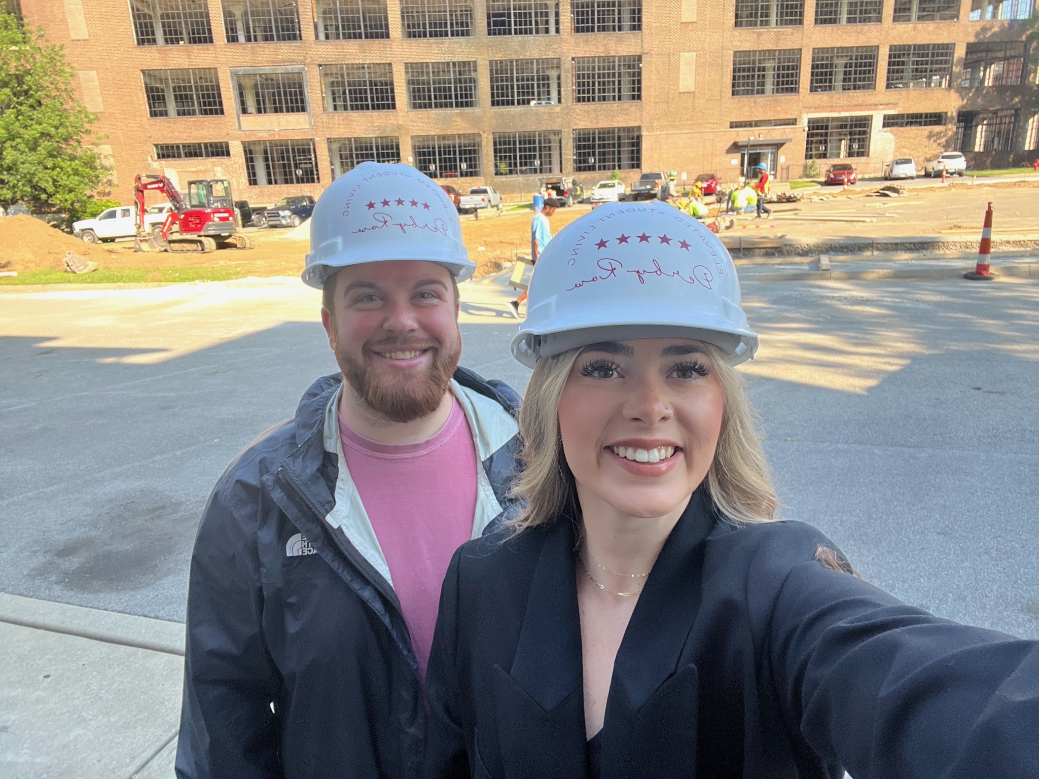 Two members of the Smarter Furnishings team on-site at a large-scale project in the Education market.