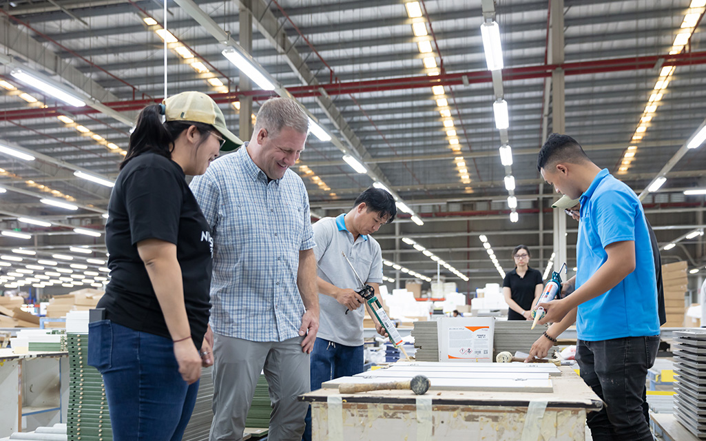 smarter furnishings team members working with a client collaboratively