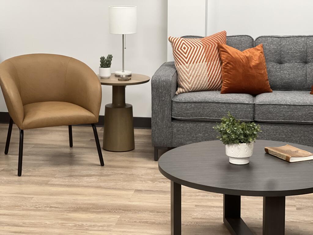 couch and chair in student apartment