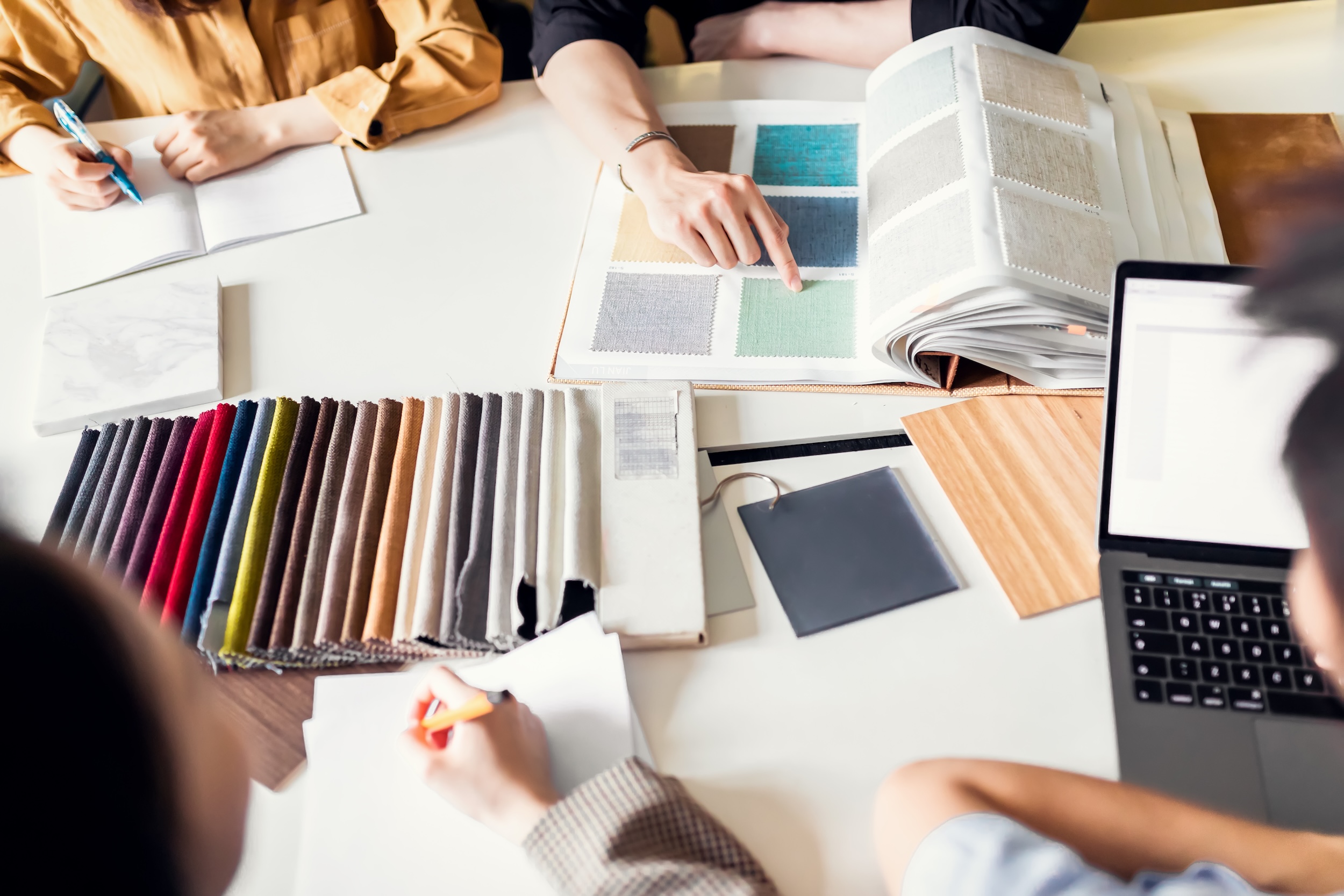 architects and designers working together on commercial contract furniture design