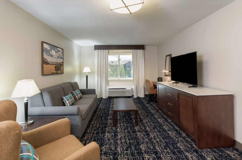a hotel suite living room - custom furniture designed by smarter furnishings