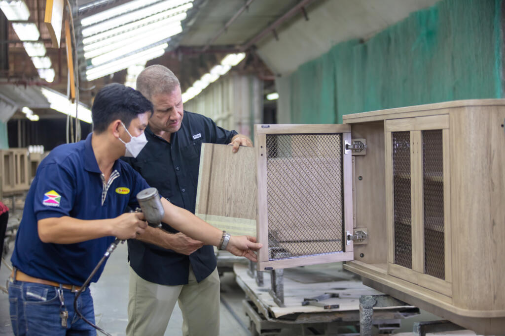 two engineers working on a commercial furniture project